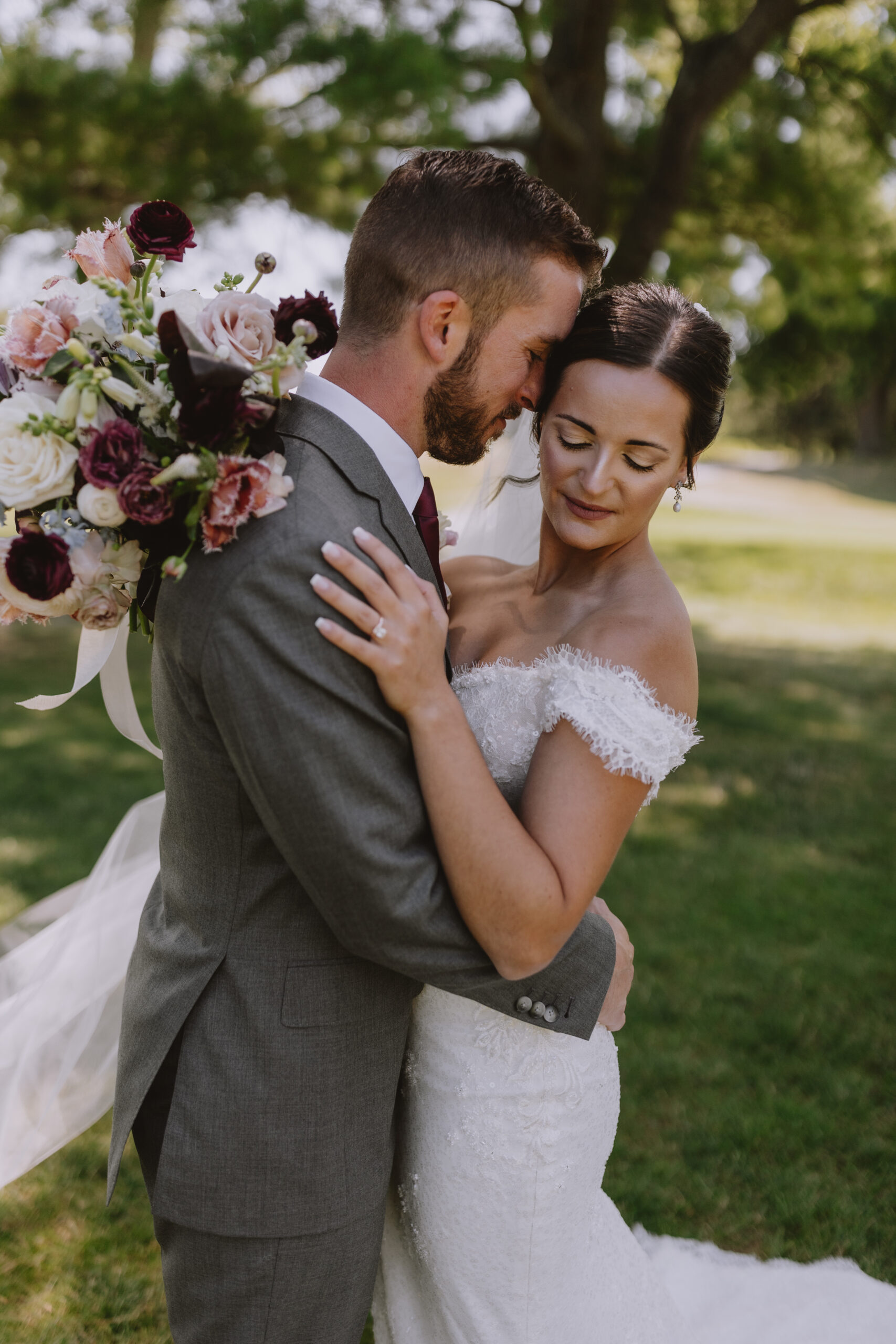 bride and groom hugging