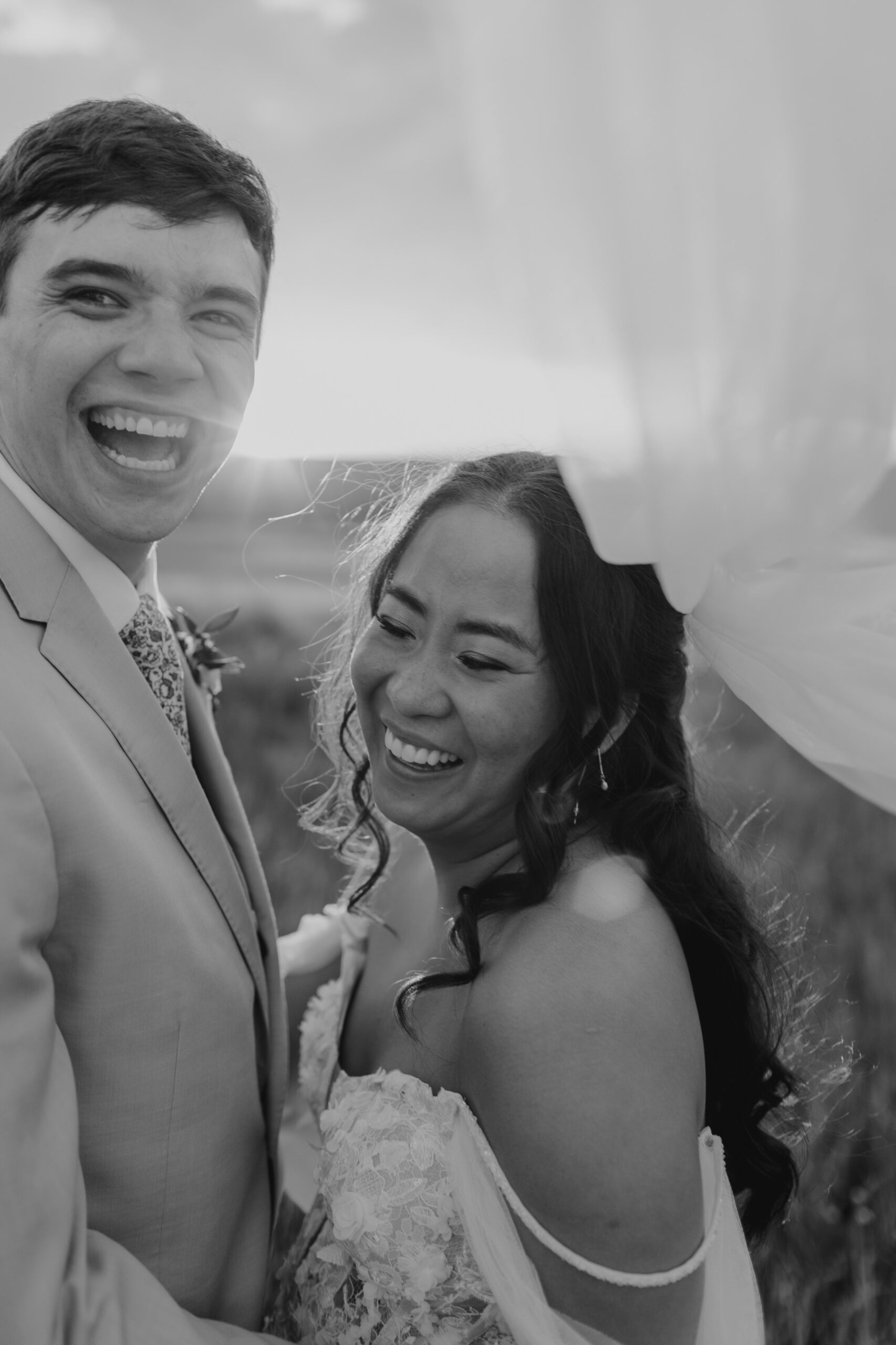 bride and groom smiling