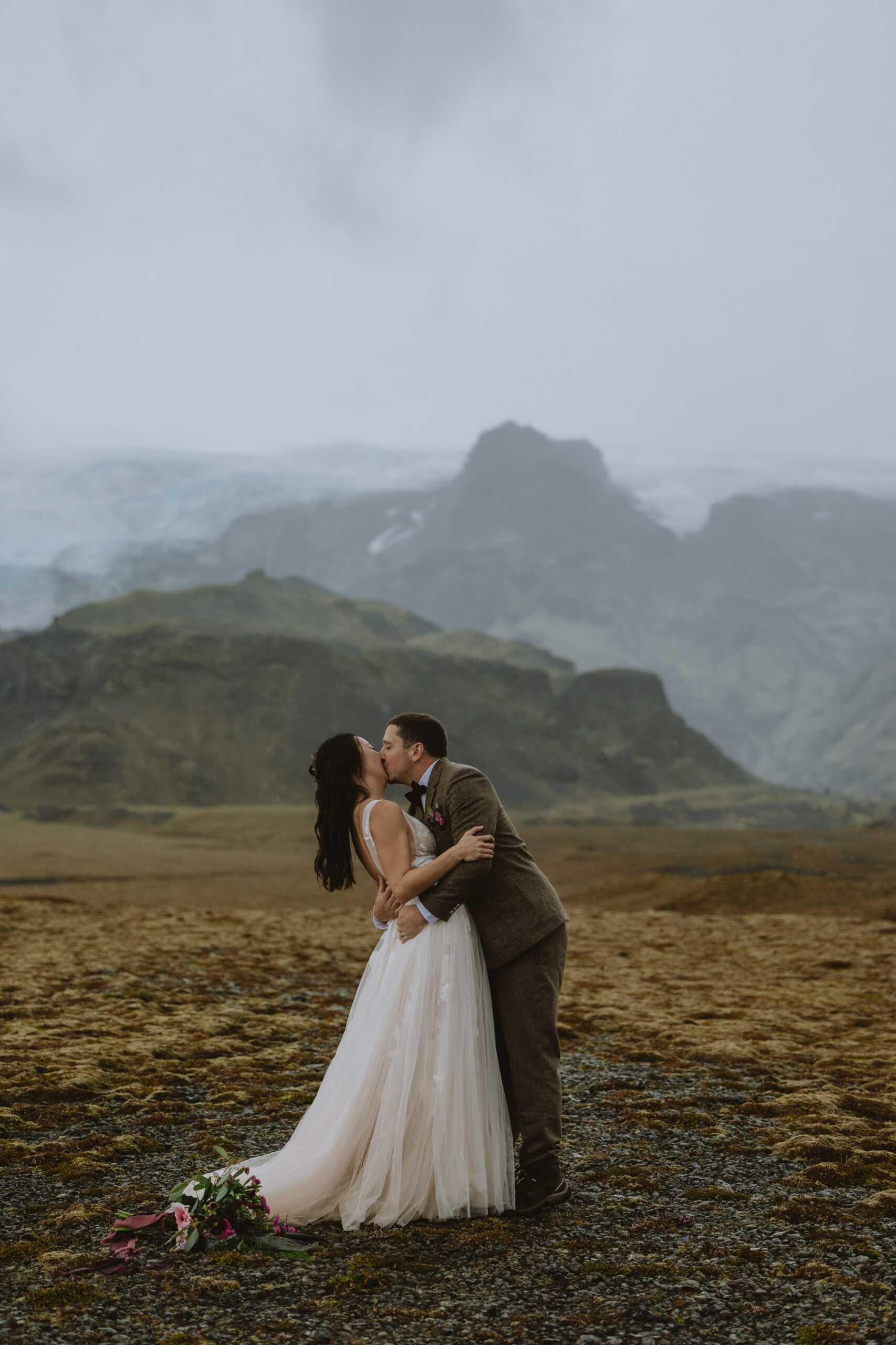 bride and groom kissing