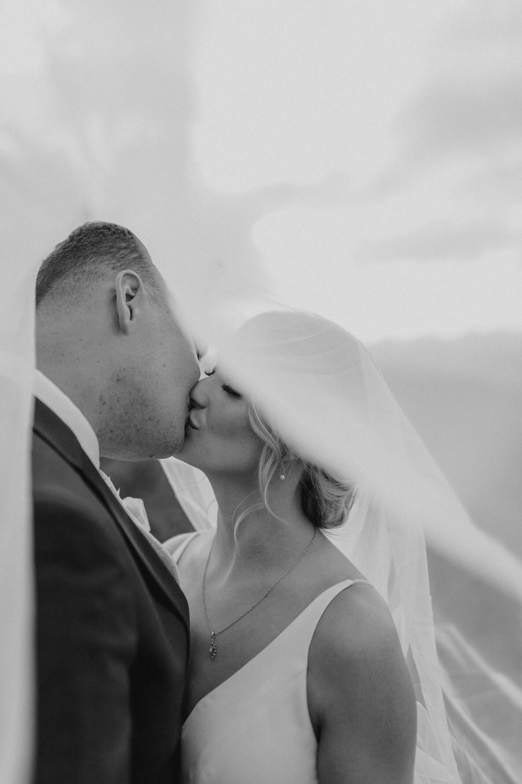 bride and groom kissing