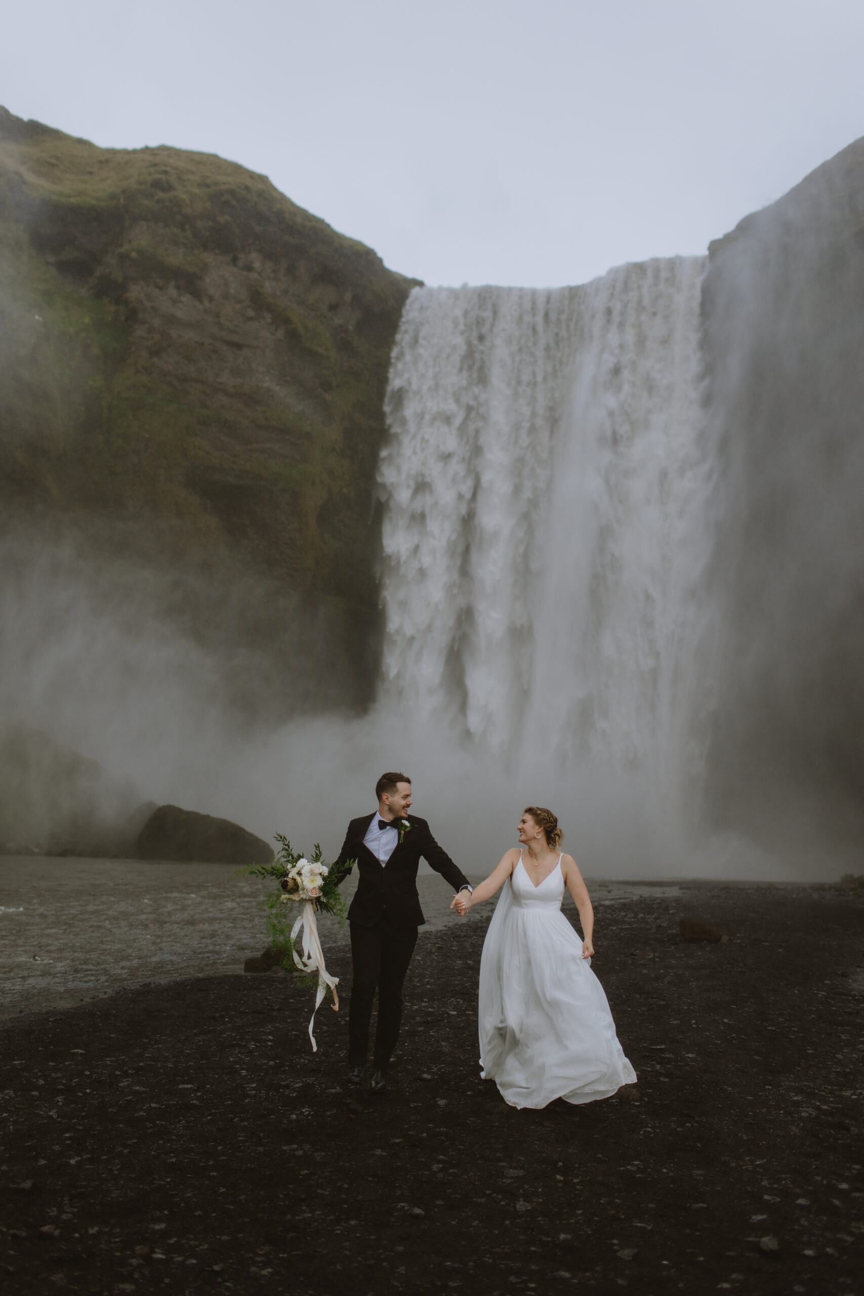 Bride and Groom at Skogafoss Waterfall in Iceland